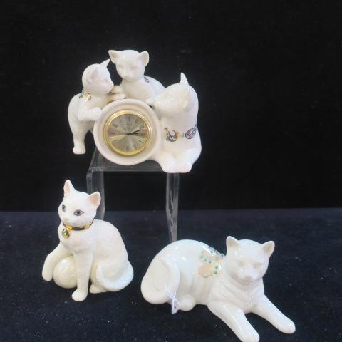 Three Pieces LENOX CATS, JEWELS COLLECTION:: Three Pieces LENOX CATS, JEWELS COLLECTION: Cat with Ball of Yarn, 4 1/2" Tall. Laying Cat, 2 1/2"Tall and Mama and Kittens with Quartz Clock, 4" T. Trimmed in Jeweled Collars, Painted Eyes, LENOX Mar