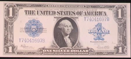 $1 1923 "Bed Sheet" Silver Certificate, Uncirculated:: $1 1923 "Bed Sheet" Silver Certificate, Uncirculated: FR 237. Now Standard Portrait of Washington on Front. With Blue Seal. Speelman and White. (160-300)