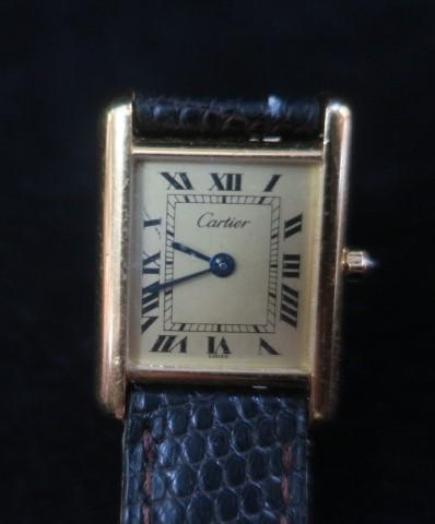 CARTIER 'Must be Cartier" Tank Watch:: CARTIER 'Must be Cartier" Tank Watch: Marked Tank Swiss Made, Vermeil Argent 925, Plaque of G 20M 1613 CC656637. Sapphire Stem, Original Leather Band Marked Cartier Paris, Made in France OAQDAA20. Not