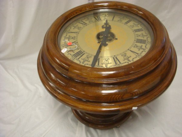 Fruitwood Case Clock Table:: Fruitwood Case Clock Table: Secret Compartment in Pedestal. Gold Metal Face, Has Key, Working Order. 22"T, 27" Diameter.