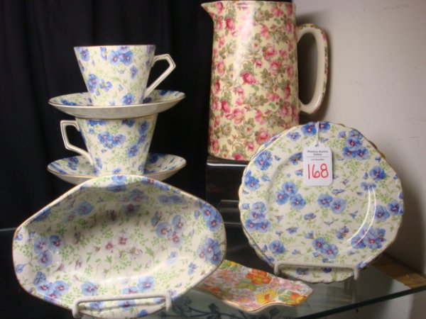 BCM LORD NELSON WARE Chintz Tableware:: BCM LORD NELSON WARE Chintz Tableware: "Pansy" Pattern includes Two 6" Plates, 6 1/2"L Oval Bowl, 3 Cups and Saucers. 7"T Pink and White Rose Pattern Jug and 6 1/4" X 2 1/2" Country Lane Pattern Tray.