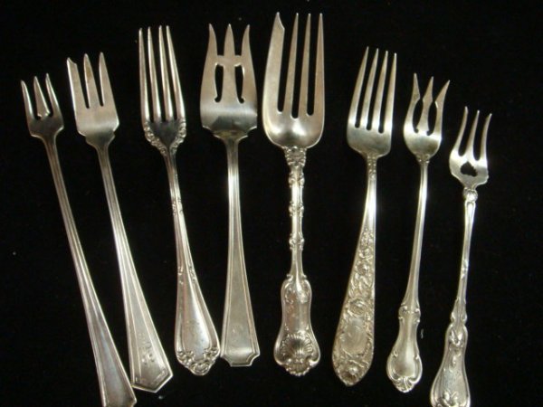 8 Assorted Sterling and Silver-plate Forks, 4.59o: 8 Assorted Sterling and Silver-plate Forks, 4.59ozt: Includes Wallace 1855 Silver-plate Fork and 1877 NF Co Pickle Fork. Sterling is Kirk Rose 6 1/4" Fork, Whiting Imperial Queen Cold Meat Fork, Inter