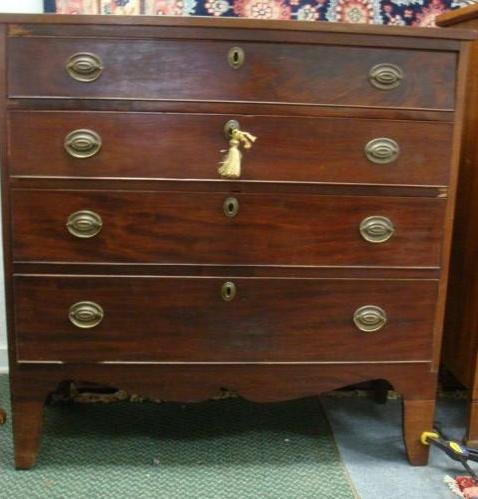1890 4 Drawer Sheraton Mahogany Chest:: 1890 4 Drawer Sheraton Mahogany Chest: Brass Escutcheons with Brass Pulls (2 Missing). Scalloped Apron, Tapered Legs. 41"W X 20"D X 41"T.