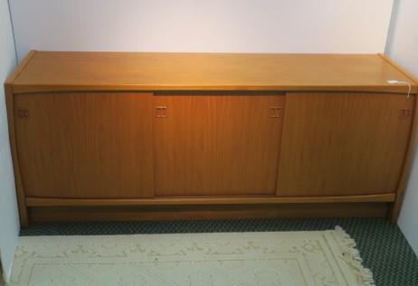 Teak Mid-Century Danish Modern Credenza:: Teak Mid-Century Danish Modern Credenza: Three Sliding Doors over Four Internal Shelves. Curved Sides and Horizontal Moldings Frame Doors. 29 1/2" x 73" x 19 3/4". (800-2400)