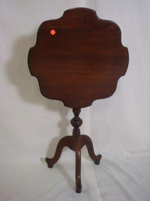 Petite Tilt Top Shaped Top Table:: Petite Tilt Top Shaped Top Table: Irregular Scalloped 18"D Top with Brass Release Latch. 24"T on Turned Stem Supporting 3 Reed Edge Curved Legs.