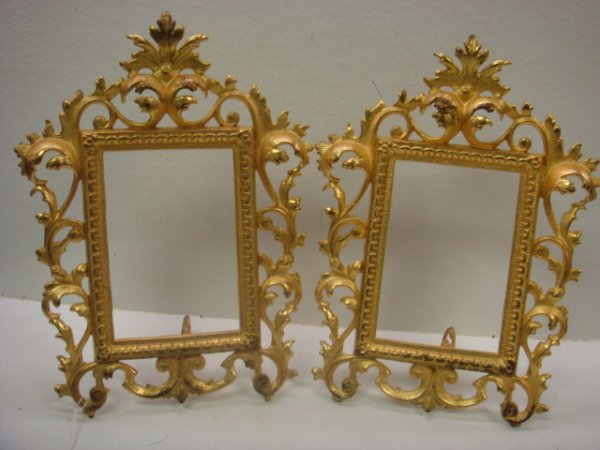 Pair of Victorian Cast iron Picture Frames:: Pair of Victorian Cast iron Picture Frames: 4 1/4" x 6 1/4" Picture Size with Overall 8 1/2" x 11". Has Bright Gold Painted Finish.
