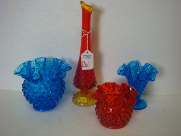 4 FENTON Hobnail Vases in Orange (Amberina) and Bl: 4 FENTON Hobnail Vases in Orange (Amberina) and Blue: 9 1/2"T Swung Orange Bud Vase has Original Label. Orange 3"T Ruffled Vase. Ca 1967-78. Colonial Blue 4" T Ruffled Vase and 3 3/4"T Footed Vase Mar