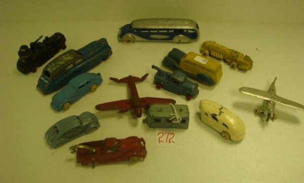 13 Cast Metal Cars, Tank, Planes and Trailers:: 13 Cast Metal Cars, Tank, Planes and Trailers: Tootsie Sedan and Bus, Hubley Racecar, 2 Two Trucks, 2 Planes-One with Riveted Wings, Repainted Fire Engine, Some Marked USA.