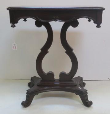 Kander Ley Bros Furniture Mahogany Side Table:: Kander Ley Bros Furniture Mahogany Side Table: Beveled Top Over Shaped Scrolled Apron with Reverse Finials at Corners, Set on Harp Base with Shaped Bottom. Four Scrolled Feet. 2 Pieces of Wood Missing