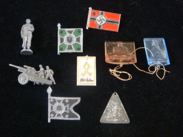 German WW II Plastic Pins:: German WW II Plastic Pins: SS Non-German Rune, Reichskreigsflagge Pin, Pionere Flag, Jager Flag, Artillery Gun Crew, Fallshirmjager Figure. (No Suggestions) Medal. (50-100)