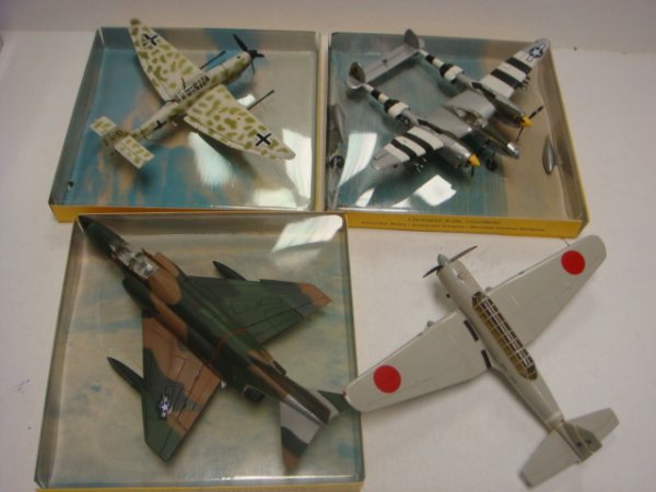 4 AHM SHOWCASE MINATURE FIGHTER PLANES:: 4 AHM SHOWCASE MINATURE FIGHTER PLANES: 1/87 Scale Metal Models of F4E Phantom II, JU 87G Stuka Dive Bomber, and P-38 Lighting Fighter, all with Display Cases. Japanese Naval Torpedo Plane with out Ca