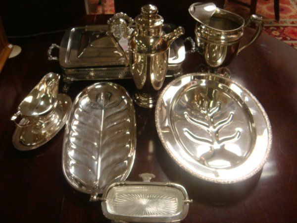 8 Silver-plate Serving Pieces: 8 Silver-plate Serving Pieces: Onieda 9 1/2" X 14 1/2" Handled Casserole Frame with Pyrex Insert and Silver-plate Lid. Gravy Boat with Underplate, Flip Top Stick Butter Dish with Insert, Cocktail Shak