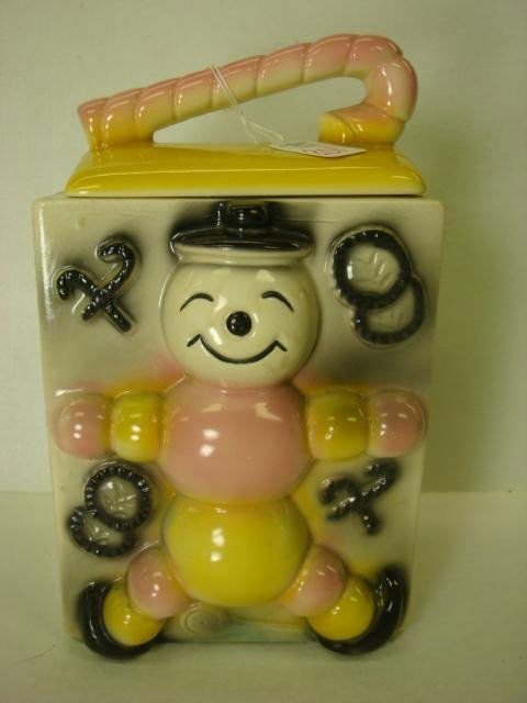 UNGEMACH POTTERY Candy Cane Babies Cookie Jar: UNGEMACH POTTERY Candy Cane Babies Cookie Jar: 11"T, U Shaped Footing Marked USA. Closely Connected with American Bisque. Some Staining. Interior Crack Appears to be from Manufacture. Does Not Go Thro