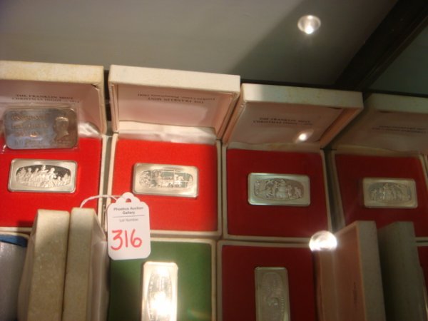 FRANKLIN MINT and Kennedy Sterling Silver Ingots: FRANKLIN MINT and Kennedy Sterling Silver Ingots: Six 1971-1976 Sterling Ingots in Individual Boxes has Bas-Relief Christmas Scenes. 5 Marked Guaranteed 1000 Grains and One Marked 500 Grains. John F K