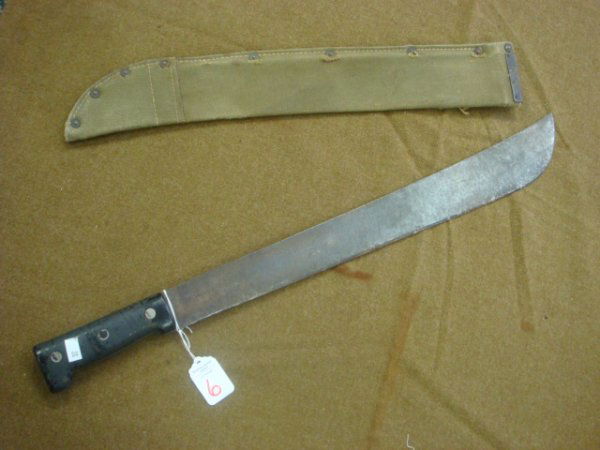 US ARMY World War II Machete with Case: US ARMY World War II Machete with Case: 18" Bladed Machete with Canvas Case with Metal Reinforcement. Made in Sheffield England. Good Condition. (50-250)