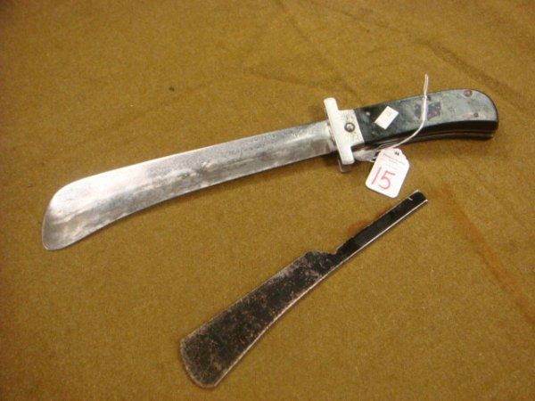 US Air Force Folding Survival Knife: US Air Force Folding Survival Knife: By CAMILLUS, Bolo Style , 10 1/2" Locking Blade Knife Can Be used as a Machete or Fighting Knife. Blade has Metal Edge Cover. Very Good Condition. (25-150)