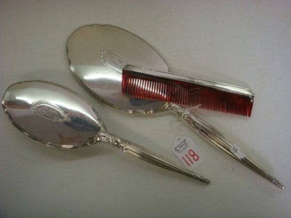 3 Piece Sterling Mirror, Brush and Comb Set: 3 Piece Sterling Mirror, Brush and Comb Set: Mirror is 13 1/4"L. Glass has Cloudiness. Brush is 10 1/2"L with Nylon Bristles Set in Wooden Base. Comb is 7"L. Monogrammed B". (100-200)