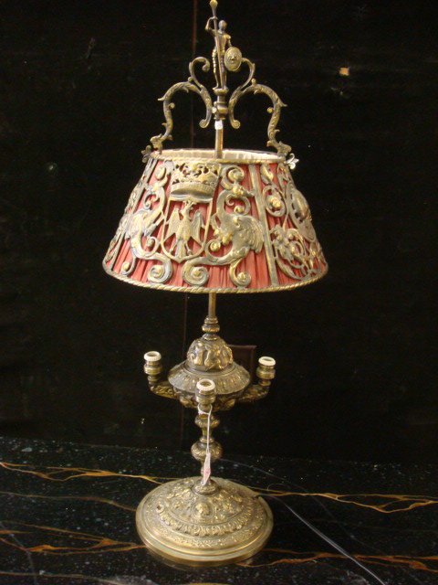 4 Light Brass Lamp with Brass and Cloth Shade:: 4 Light Brass Lamp with Brass and Cloth Shade: Armored Knight Finial on Phoenix & Crown Pierced Shade Over Silk. Figural Base, European Lamp Fixtures. 25"T. (60-100)