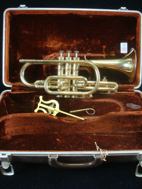 OLDS Ambassador Brass 1950's Trumpet in Hard Case: OLDS Ambassador Brass 1950's Trumpet in Hard Case: Made in CA, Serial # 627602 on Valve, 1951-1952. In Fitted Velvet Lined Case. (150-200)