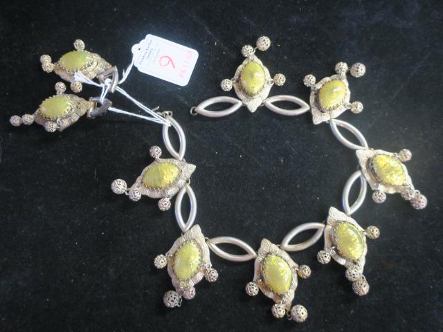 Cats Eye Foil Cabochon Stone Necklace & Earrings:: Cats Eye Foil Cabochon Stone Necklace & Earrings: 7 Domed Clear Stones With Yellow/Green Backing. From the Late 50's, Made in France. Each Stone Accented with Filigree Balls Suspended From an Articula