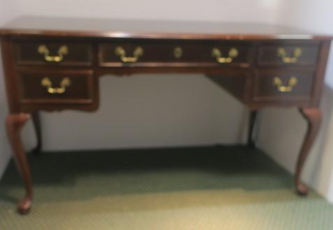 Mahogany Five Drawer Desk with Cabriole Legs:: Mahogany Five Drawer Desk with Cabriole Legs: Brass Pulls and Escutcheons. French Pointe Finish over Banded Desk Top. Measures 30" x 54" x 27". (200-600)