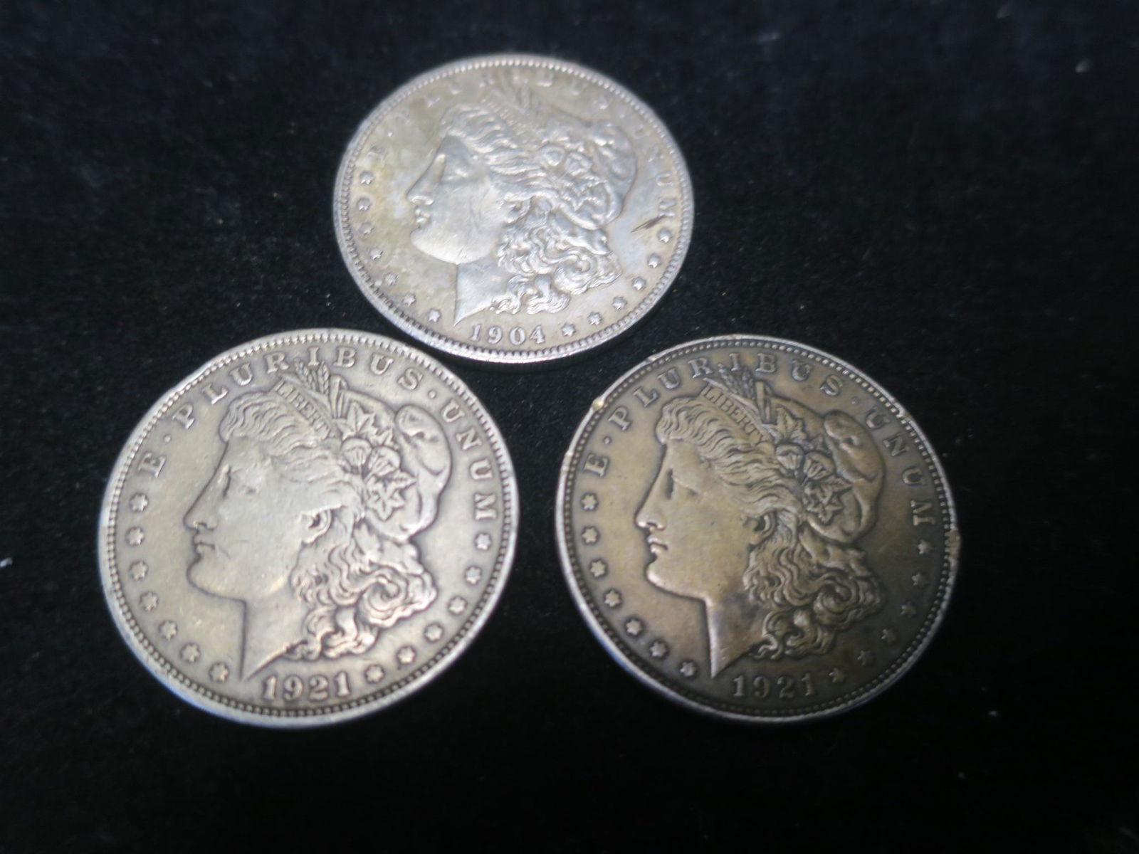 Three 90% Pure Silver US Morgan Silver Dollars: (1 of 2)