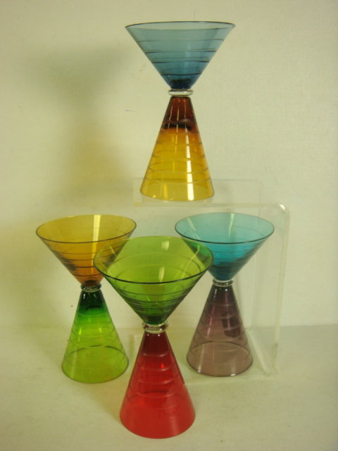 Set of 4 Art Glass 1940's Deco Martini/Wine Glasse: Set of 4 Art Glass 1940's Deco Martini/Wine Glasses: Each 6 1/4"T Glass Flips Over to Serve Wine on One Side or Martinis on the Other. Etched Rings Surround Red, Green, Blue, Turquoise and Amber Glass