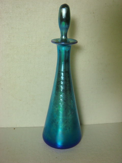 STEUBEN Blue Aurene Perfume Bottle: STEUBEN Blue Aurene Perfume Bottle: Teepee Form with Original Elongated Tear Drop Stopper. Ca 1930. 7 1/2"T. (500-700)