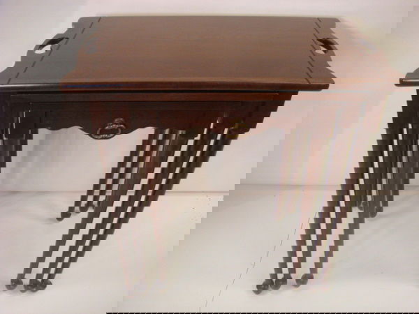 3 Mahogany Tapered Leg Stacking Side Tables: 3 Mahogany Tapered Leg Stacking Side Tables: Largest Table is 26"L X 16"W X 25"T with Each One Progressively Smaller. Pad Feet. Top Give the Appearance of Butlers Tray. (150-300)