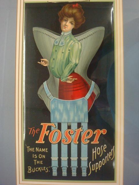 Circa 1900 Litho Over Celluloid Advertising Poster: Circa 1900 Litho Over Celluloid Advertising Poster: Advertising Foster Garter Belts. Image is 16 1/2" X 8 1/4", Triple Matted and Framed to 15" X 23". (100-200)