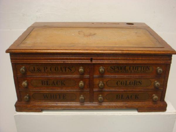 J & P COATS 6 Drawer Oak Spool Cabinet:: J & P COATS 6 Drawer Oak Spool Cabinet: 14" X 23" X 33"L. Finger Jointed Drawers with Original Stenciling. Slant Top Opens for Storage. (300-500)