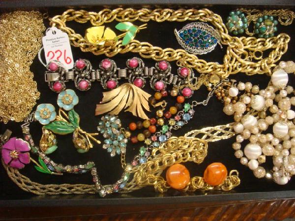 Collection of Signed and Rhinestone Costume Jewelr: Collection of Signed and Rhinestone Costume Jewelry: Includes Gold Chains, Lisner Necklace, Trifari Brooch, Earrings, etc. (60-100)