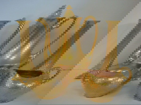 Gold Encrusted Teapot, Candlesticks, Sugar/Creamer: Gold Encrusted Teapot, Candlesticks, Sugar/Creamer: 9 1/2"T Pickard Teapot in Rose and Daisy Pattern, Bernardaud & Cie Limoges 8"T Candlesticks Signed LDWG 8-1935. Wheeling Textured Floral Pattern in