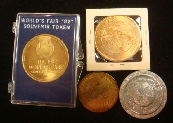 4 Coin Tokens from World's Fairs 1939-1982: 4 Coin Tokens from World's Fairs 1939-1982 1939 Golden Gate Expo, 1962 Settle World's Fair, 1964 New York World's Fair and 1982 Knoxville World's Fair. (40-60)