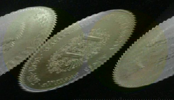 English Commemorative Dollar Coins: English Commemorative Dollar Coins: 1965 Churchill Commemorative 25 Pence Piece and 1972 ELIZABETH AND PHILLIP 20 NOVEMBER 1947-1972 25th Anniversary 25 Pence Piece. Both MS 60 Condition. (25-50)