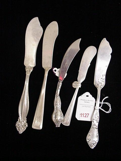 5 Sterling Silver Butter Knives: 5 Sterling Silver Butter Knives: 7"L. Wallace Silversmiths "Cabot" is Monogrammed; 5 3/4"L. Watson "Wentworth" 1913 Pat. 7 1/4"L. International "Jeanne D'Arc"; 7"L. Knife has Illegible Mark; 6"L. Curv
