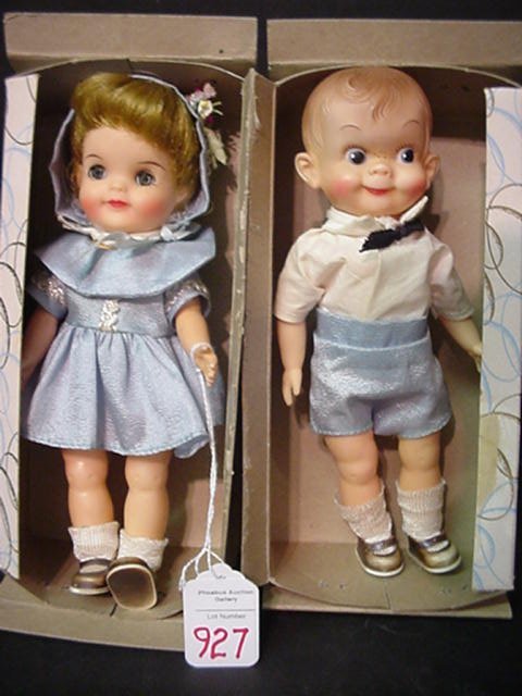 Effanbee Fluff Brother and Sister Dolls: Effanbee Fluff Brother and Sister Dolls in Box: Rubber 8" Boy has Molded and Painted Features. Girl is Same Size with Wig and Sleep Eyes.