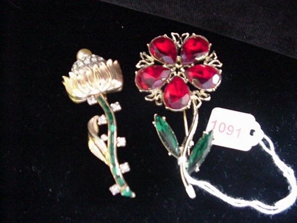 Doddz and Mazer Stemmed Flower Brooches: Doddz and Mazer Stemmed Flower Brooches: 3 1/2" Doddz has Red Petals and Mazer has Round White Pave Stones with Green Baguette Stem.