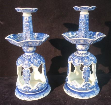 Pair of Blue and White Porcelain Incense Burners:: Pair of Blue and White Porcelain Incense Burners: 9" Tall X 4" Diam. Two Floors with Hole in Roof for Joss Stick. Open Base For Cone Option. Done in Sometsuke Technique of Indigo Blue on white. (150-3