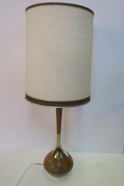 Mid-Century Modern Wood and Brass Table Lamp:: Mid-Century Modern Wood and Brass Table Lamp: Bulbous Base of Turned Wood with Brass Metal Decorations and Tapered Wood Shaft. Barrel Burlap Shade. 36" Tall Overall. (50-200)