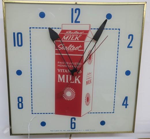 Advertising SEALTEST Milk Electric Wall Clock:: Advertising SEALTEST Milk Electric Wall Clock: Electric Clock with Cord, in Working Condition, Very Good Condition. Made by PAM CLOCK COMPANY, NEW ROCHELLE NY, J. MADE IN THE USA. CA 1960. (200-400)