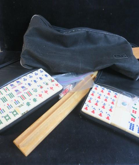 STERLING MAHJONGG Set in Leatherette Traveling Case:: STERLING MAHJONGG Set in Leatherette Traveling Case: Four Teak Wood Racks and Two Bags with 160 Plastic Tiles or Cards 1 3/8" x 1" x 3/4". With Dice. Leatherette Case is Worn. History of the Game and 
