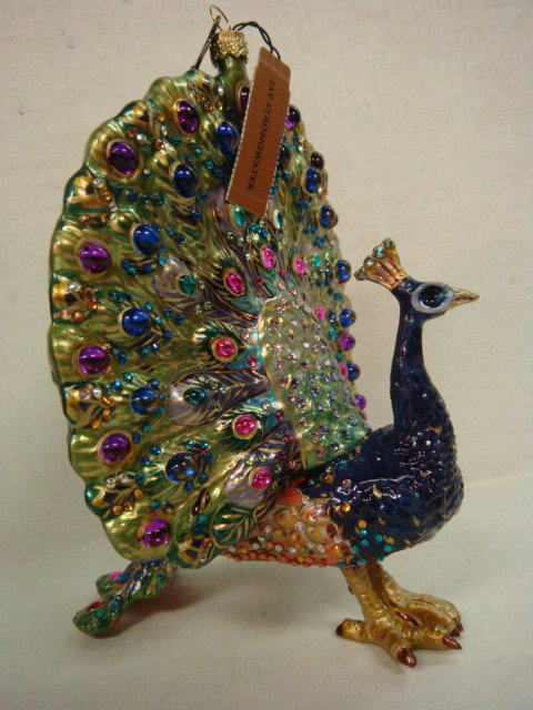 JAY STRONGWATER Mouth Blown Glass Peacock Ornament: JAY STRONGWATER Mouth Blown Glass Peacock Ornament: In Original Box, #JX70924, Signed in 2008. Hand painted Enamelwork with Handset Swarovski Crystals. 6 2/4" X 5 1/2". (100-200)