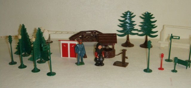 LIONEL Accessories for Lionel Train Sets Incl. Red: LIONEL Accessories for Lionel Train Sets Incl. Red Cap: Red Cap with Bags. His & Hers Outhouse and Billboard. 2 Each Street Signs, Crossing Guards, Traffic and Street Lights, and a Fire Call Box. Four