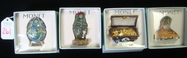 Four MONET Collectable Boxes:: Four MONET Collectable Boxes: Palm Tree, Parrot, Egg and Treasure Chest. Trinket Boxes Enameled Inside and Out with Gold Embellishment. Average 2". Trademark Stamp on Bottom. In Gift Box. (80-120)