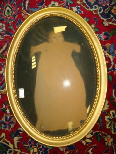 Vintage Photo of Baby in Gold Oval Bead Line Frame: Vintage Photo of Baby in Gold Oval Bead Line Frame: 12" X 18" Convex Glass with Photo of Young Baby in Christening Gown. Hand Tinted. (40-60)