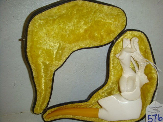 Block MEERSCHAUM Handcarved Pipe with Nude Woman: Block MEERSCHAUM Handcarved Pipe with Nude Woman: Handcarved in Turkey, Bakelite Stem. Never Used. Kneeling Nude Female Has Damaged Elbow. 5 1/2"L X 4 1/2"T. In Fitted Lined Case. (80-120)