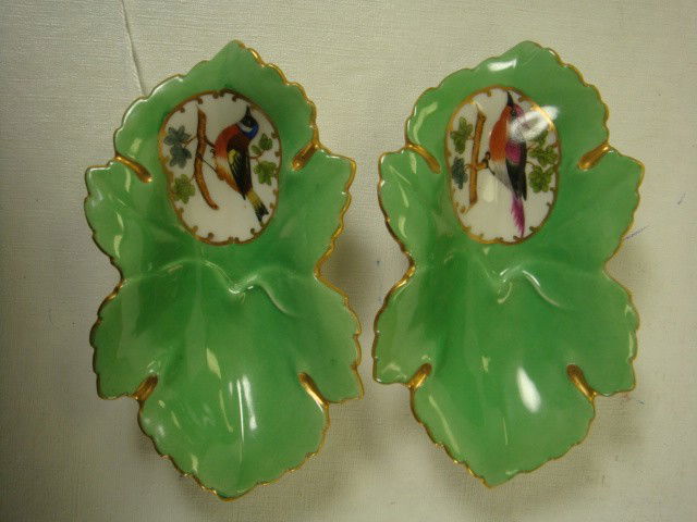 Two Early HEREND Hand Painted Bird Dishes: Two Early HEREND Hand Painted Rothchild Bird Dishes: Leaf Form Dishes with Bird on Branch Transfer. Gold Rims and Accents. Early Herend Mark and Hungary. (100-160)