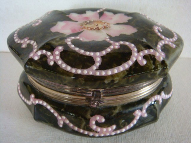CF MONROE Kelva Dresser Box:: CF MONROE Kelva Dresser Box: Hinged Box in Oblong Form. Mottled Green decorated with Large Pink Flowers and Scrolling at Edge. Enamelling on Scrolls. Gold Silk Fabric Lining. Marked Kelva. 5 1/2"W, 2 