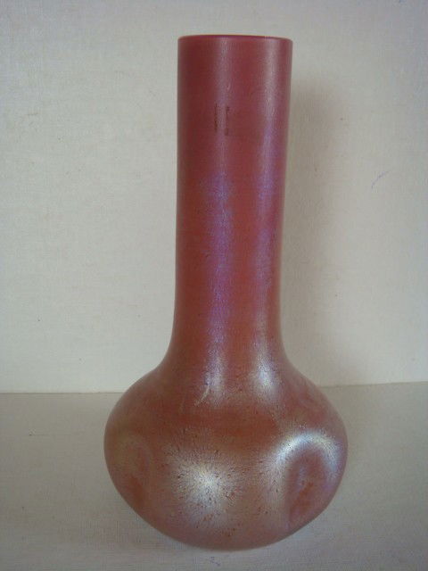 Signed LOETZ Austria Pinched Side Stick Vase: Signed LOETZ Austria Pinched Side Stick Vase: Pink Glass with Iridescent Gold Finish. 10"T. (250-400)